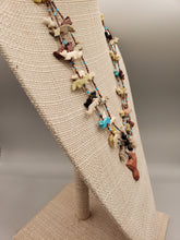 Load image into Gallery viewer, HANDCARVED NAVAJO EAGLE FETISH NECKLACE - 3 STRAND