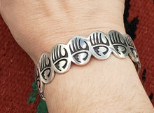 Load image into Gallery viewer, BADGER PAW DESIGN HOPI BRACELET - HAROLD LOMAYAKTEWA
