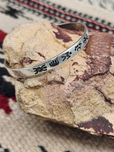 Load image into Gallery viewer, STERLING SILVER PETROGLYPH CUFF BRACELET
