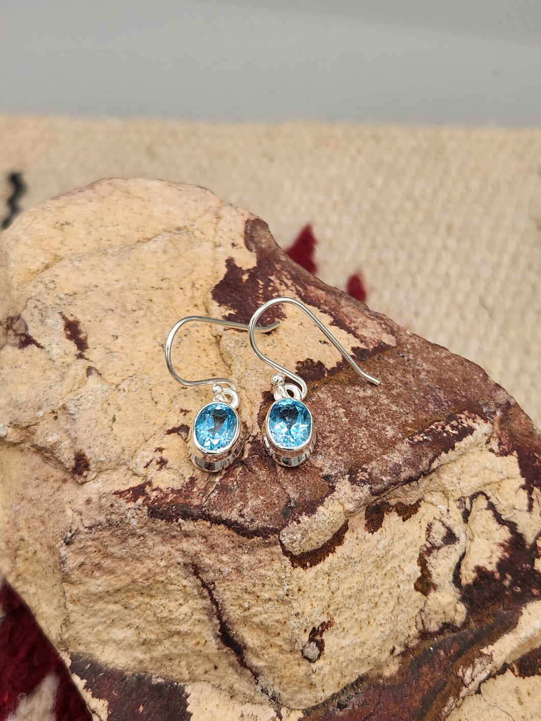 BLUE TOPAZ ( SWISS) OVAL EARRINGS