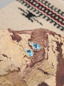 BLUE TOPAZ ( SWISS) OVAL EARRINGS