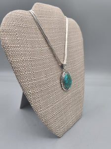 TURQUOISE PENDANT ON LIQUID SILVER  - DANIEL  BENALLY