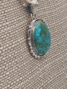 TURQUOISE PENDANT ON LIQUID SILVER  - DANIEL  BENALLY