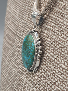 TURQUOISE PENDANT ON LIQUID SILVER  - DANIEL  BENALLY