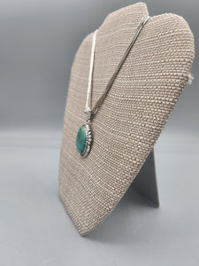 TURQUOISE PENDANT ON LIQUID SILVER  - DANIEL  BENALLY