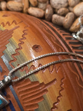 Load image into Gallery viewer, TURQUOISE CHIP INLAY ARROWHEAD PENDANT FEATURING BEAR - MEDIUM
