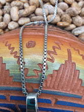 Load image into Gallery viewer, LARGE TURQUOISE CHIP INLAY ARROWHEAD PENDANT FEATURING WOLF
