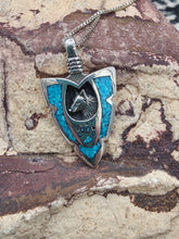 Load image into Gallery viewer, TURQUOISE CHIP INLAY ARROWHEAD PENDANT FEATURING WOLF - MEDIUM

