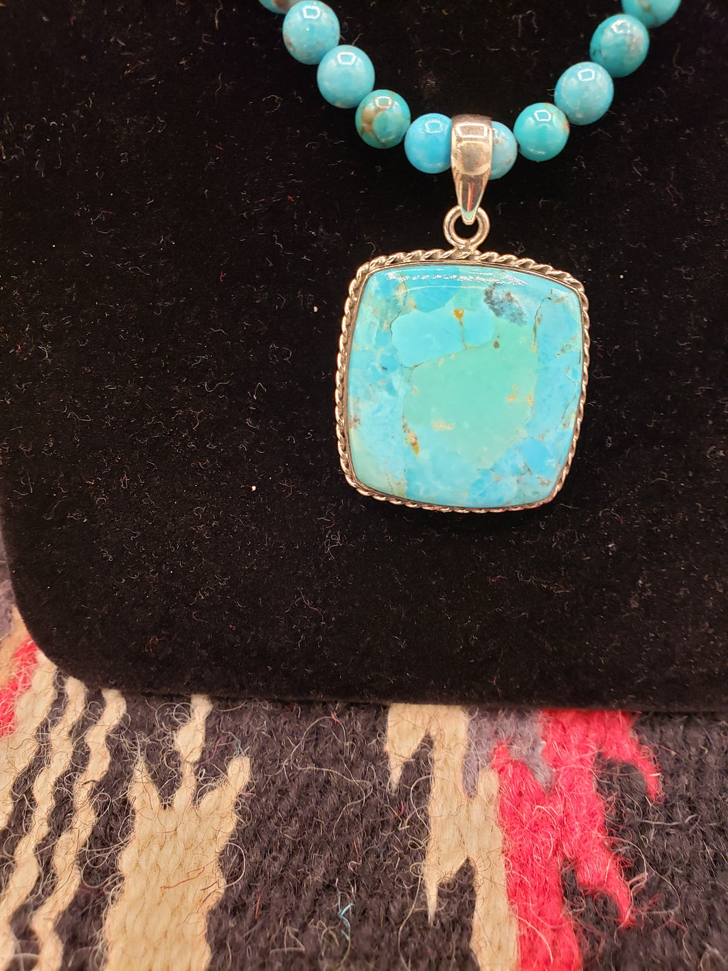 TURQUOISE SQUARE PENDANT ON 6MM BEADS
