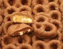 Load image into Gallery viewer, Milk Chocolate Peanut Butter Pretzels 8 oz
